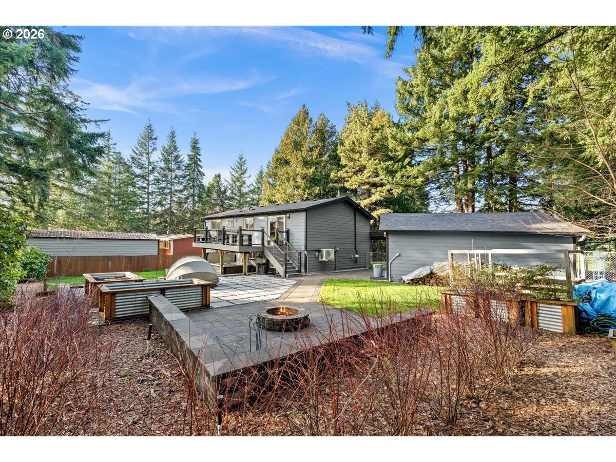 17110 South Potter Road Oregon City, OR 97045 - Photo 35 of 46 a view of a house with swimming pool and sitting area