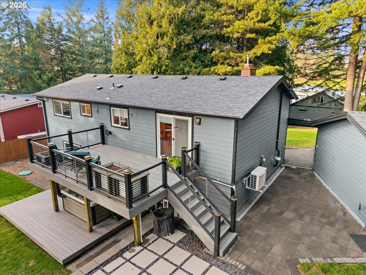 17110 South Potter Road Oregon City, OR 97045 - Photo 43 of 46 an aerial view of a house with balcony table and chairs