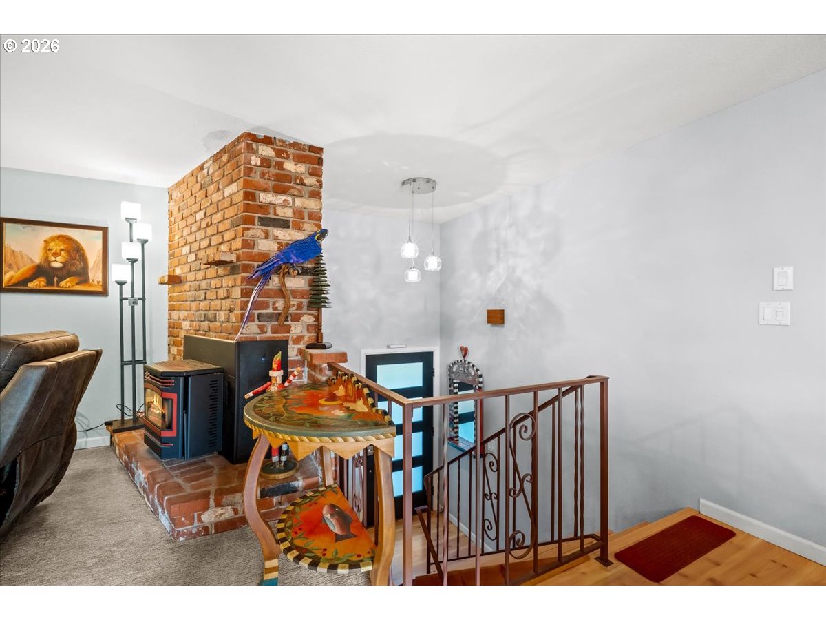 17110 South Potter Road Oregon City, OR 97045 - Photo 5 of 46 a view of a dining room with furniture and chandelier