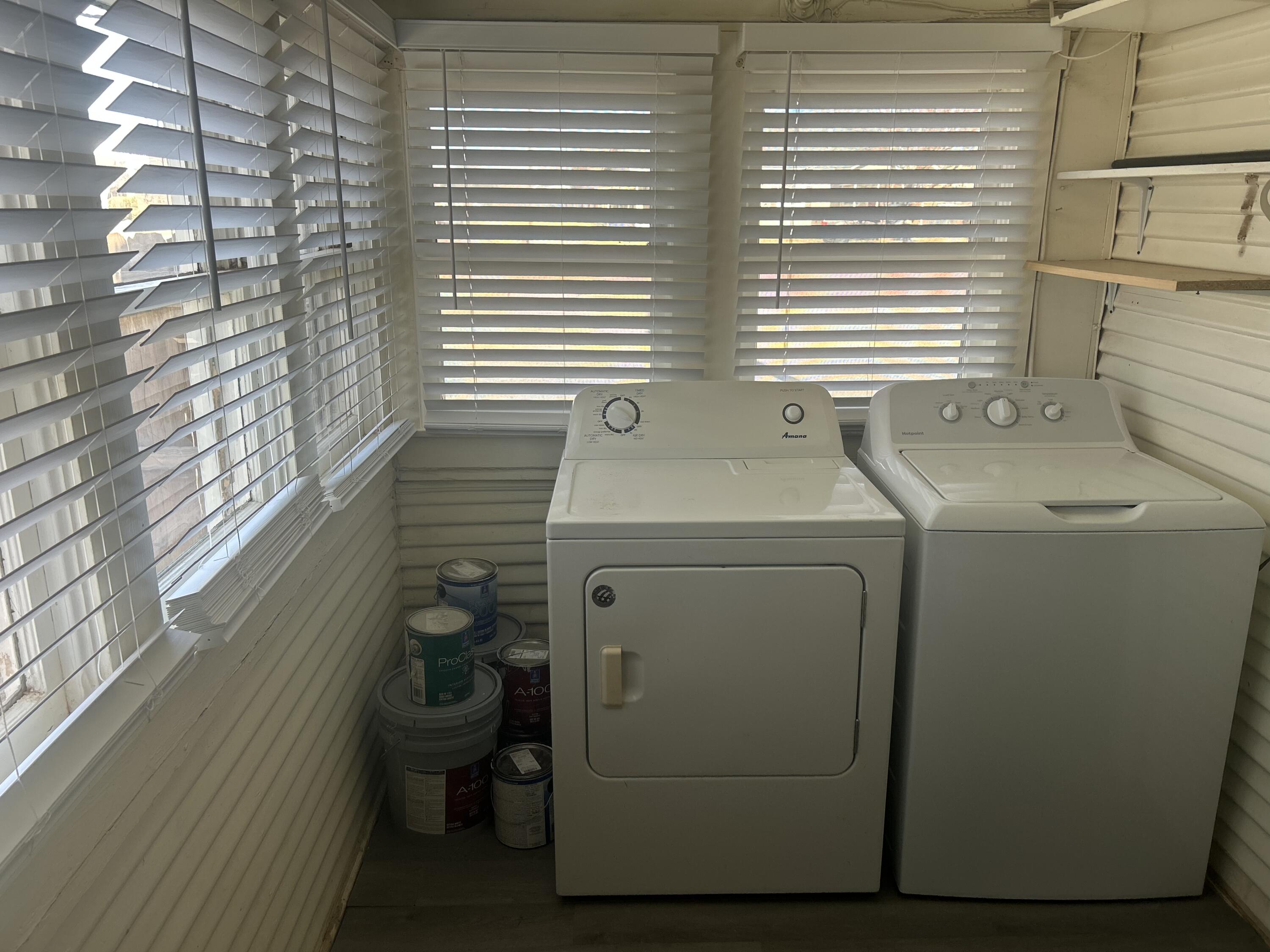 605 South 10th Street Slaton, TX 79364 - Photo 14 of 19 a utility room with dryer and washer