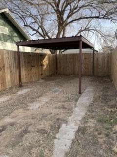 605 South 10th Street Slaton, TX 79364 - Photo 19 of 19 a backyard of a house