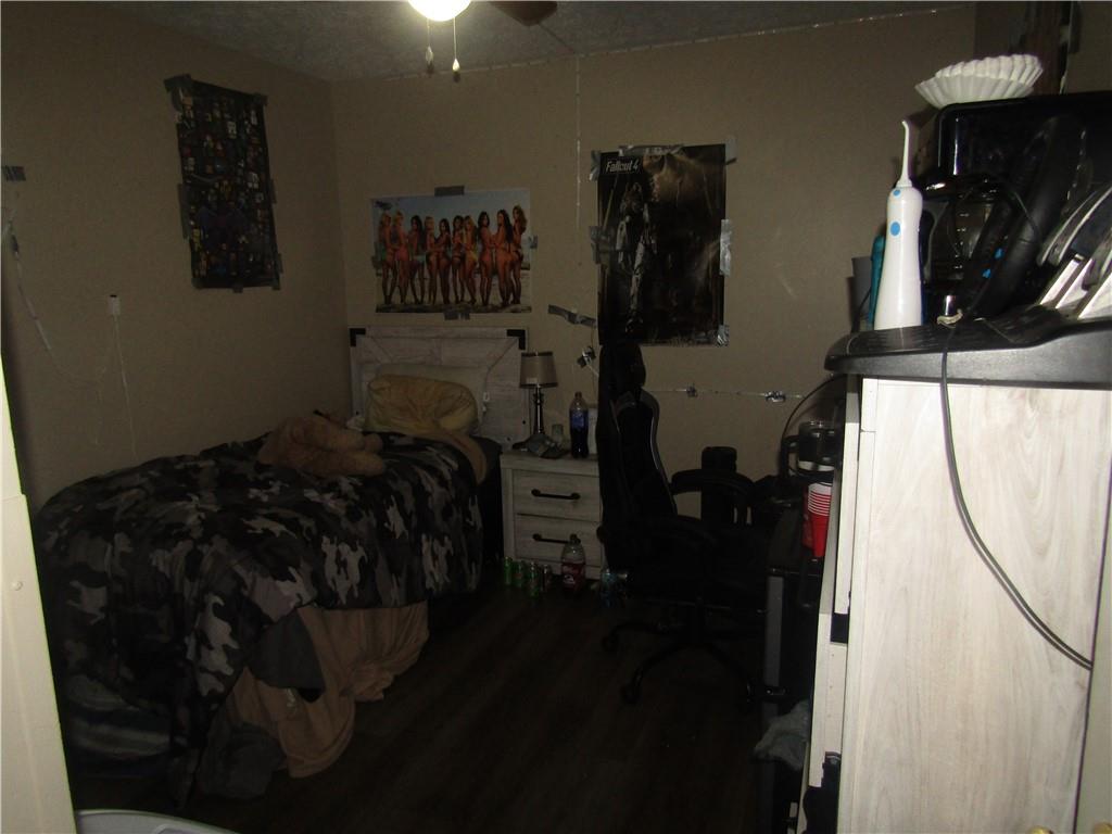 724 Stewart Street Berlin, PA 15530 - Photo 18 of 20 a bed room with a bed and a television