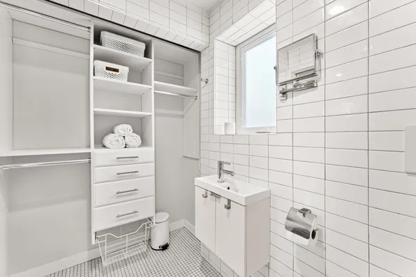 a bathroom with a bathtub sink and toilet