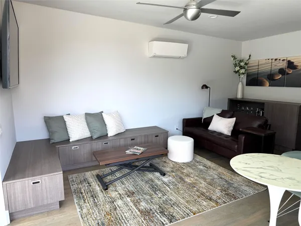 a living room with furniture and a couch