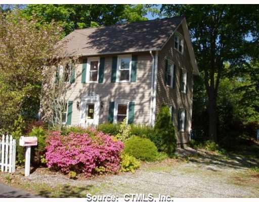 8 Burroughs Lane Deep River, CT 06417 - Photo 1 of 1 a front view of a house with a yard