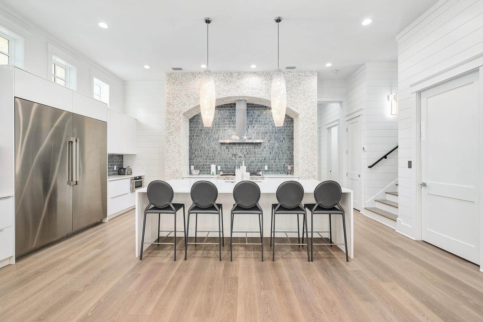 52 Seven Palms Dr Inlet Beach Inlet Beach, FL 32461 - Photo 16 of 51 a living room with couches chairs and kitchen view with wooden floor