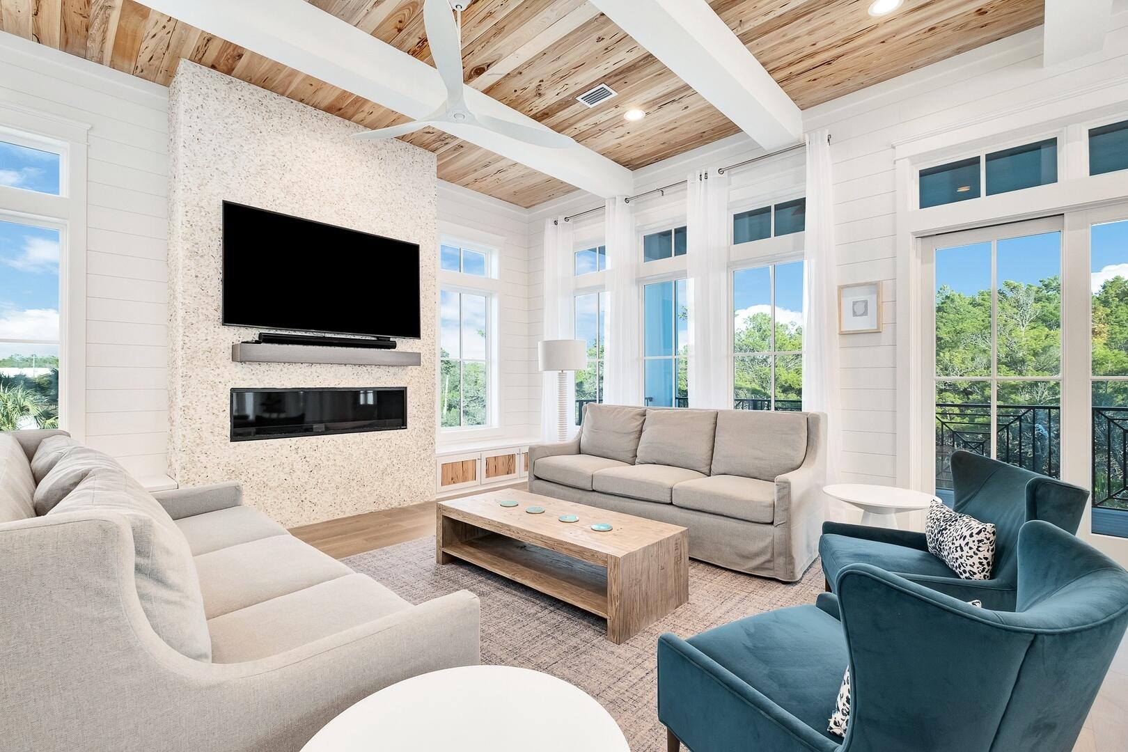 52 Seven Palms Dr Inlet Beach Inlet Beach, FL 32461 - Photo 20 of 51 a living room with furniture a flat screen tv and a large window