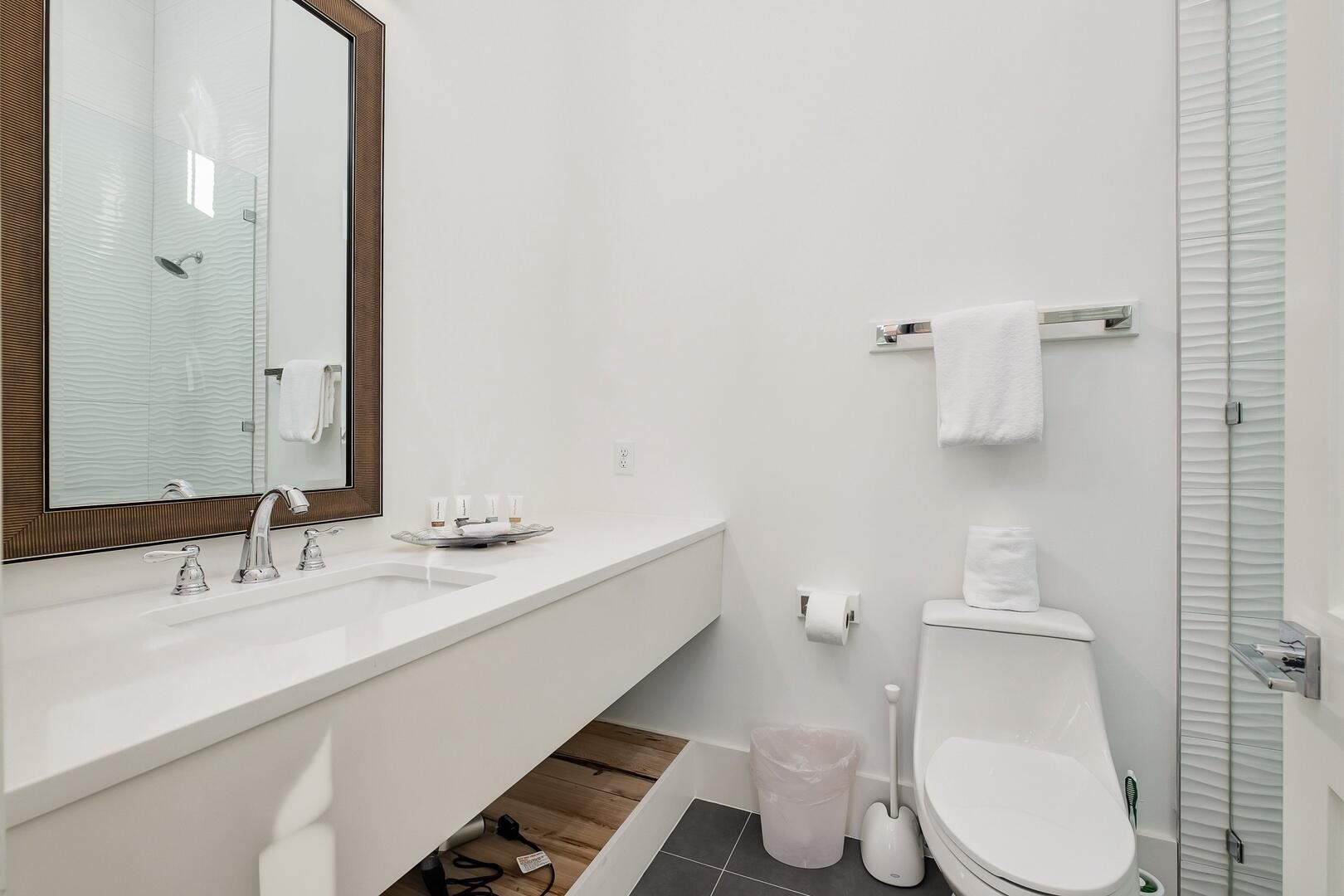 52 Seven Palms Dr Inlet Beach Inlet Beach, FL 32461 - Photo 24 of 51 a bathroom with a sink mirror and toilet