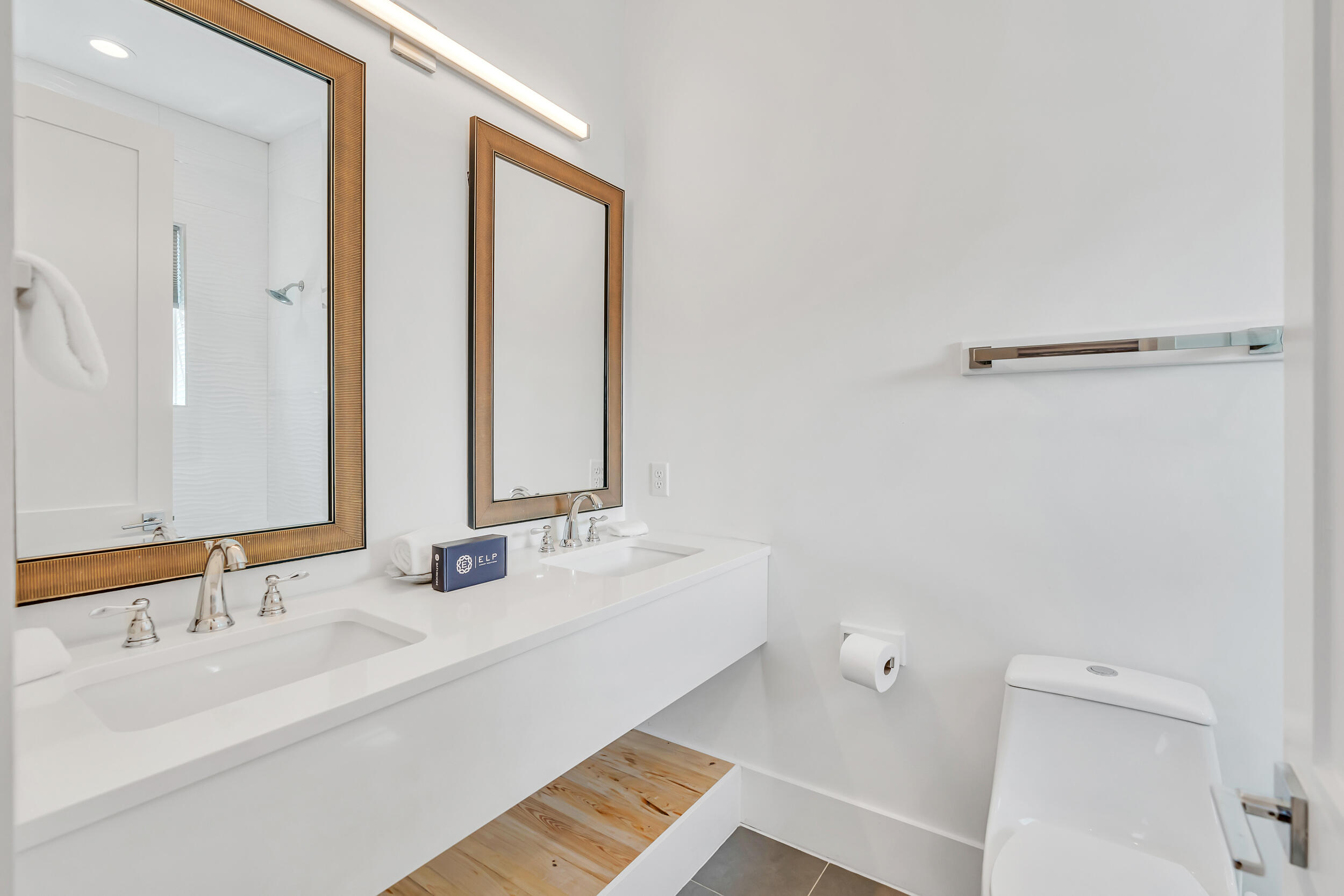 52 Seven Palms Dr Inlet Beach Inlet Beach, FL 32461 - Photo 32 of 51 a bathroom with a bathtub sink vanity and a mirror