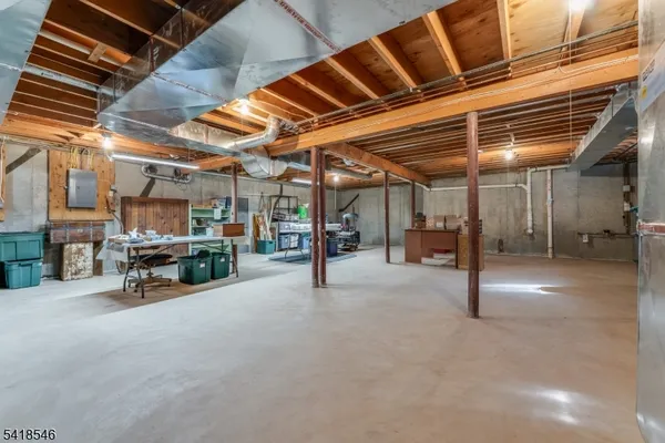 a view of a garage with wooden floor