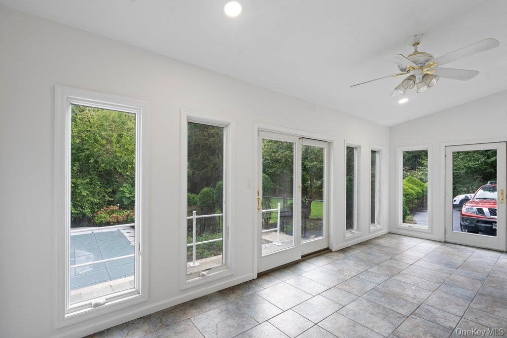 83 Shore Road Mount Sinai, NY 11766 - Photo 17 of 33 a view of an entryway with a window