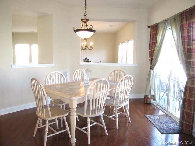 6644 Evanton Loch Road Charlotte, NC 28278 - Photo 11 of 24 a view of a dining room with furniture window and outside view
