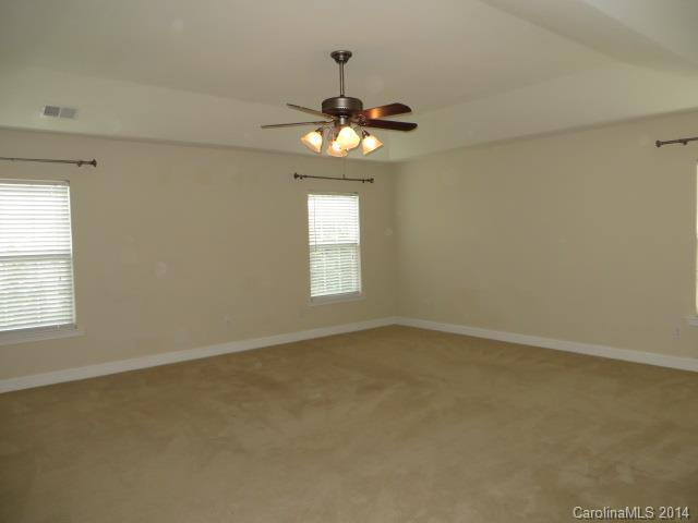 6644 Evanton Loch Road Charlotte, NC 28278 - Photo 13 of 24 an empty room that has a window