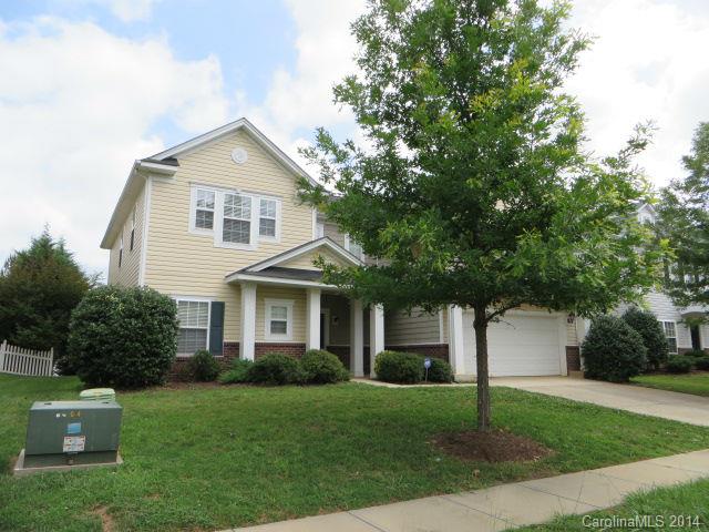 6644 Evanton Loch Road Charlotte, NC 28278 - Photo 23 of 24 a front view of a house with a yard and trees