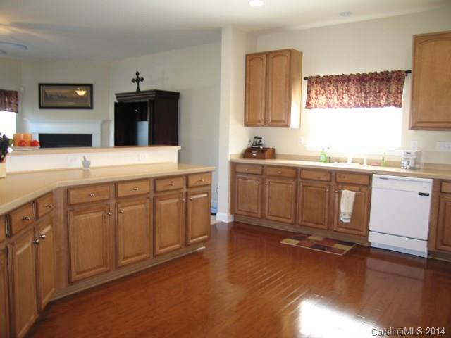 6644 Evanton Loch Road Charlotte, NC 28278 - Photo 7 of 24 a spacious bathroom with a granite countertop sink and a mirror