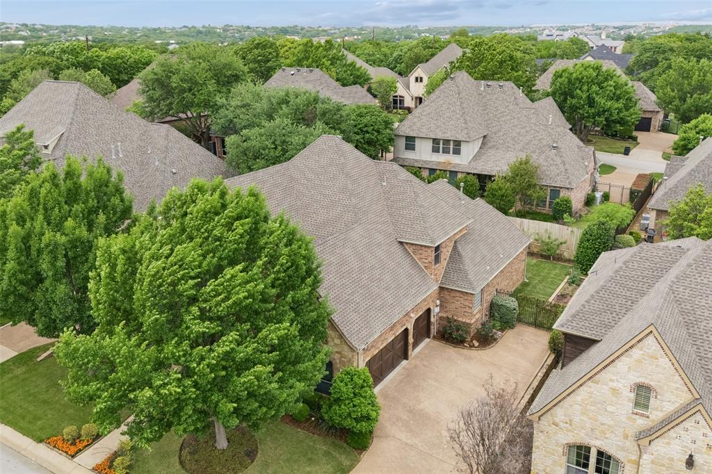 1608 Tuscan Ridge Circle Southlake, TX 76092 - Photo 34 of 36 an aerial view of a house with yard and outdoor seating