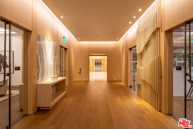 a view of a brick building next to a yard