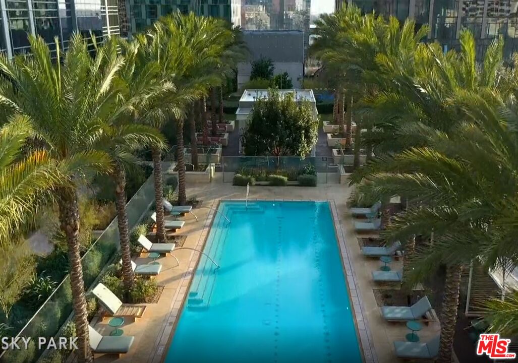 1000 West 8th Street, Unit PH5802 Los Angeles, CA 90017 - Photo 50 of 57 a view of swimming pool from a garden
