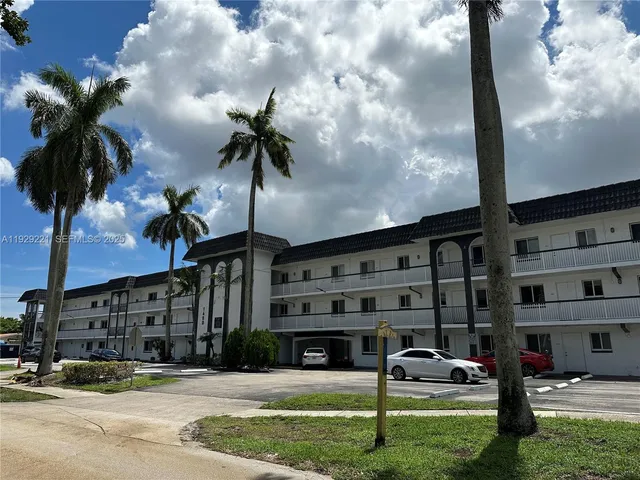 a view of building with yard
