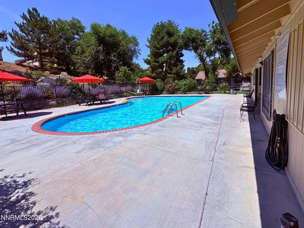 a view of outdoor space deck and swimming pool