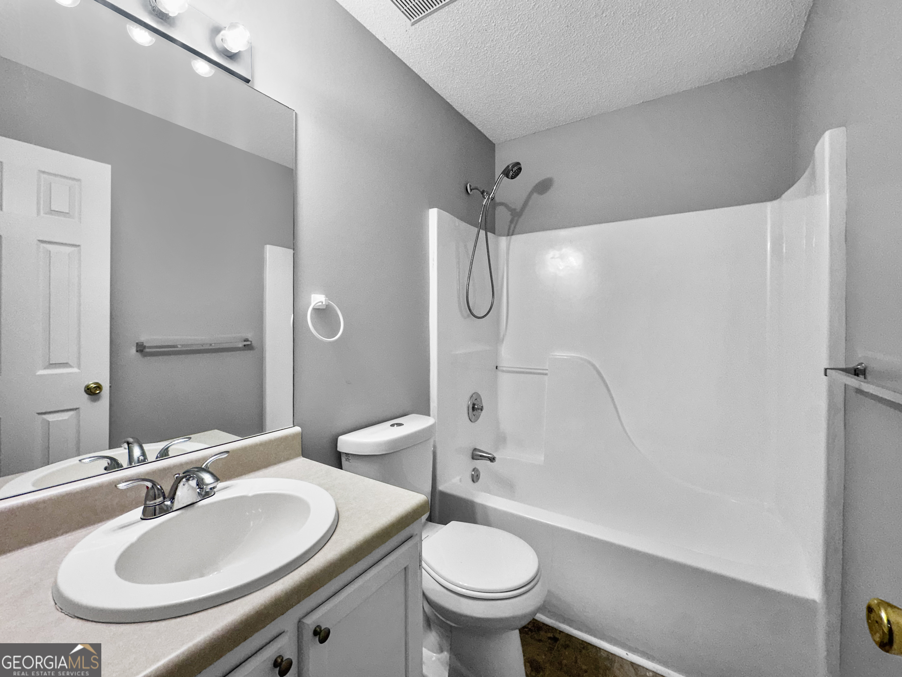 368 Wesley Mill Place Villa Rica, GA 30180 - Photo 15 of 18 a bathroom with a sink toilet and shower