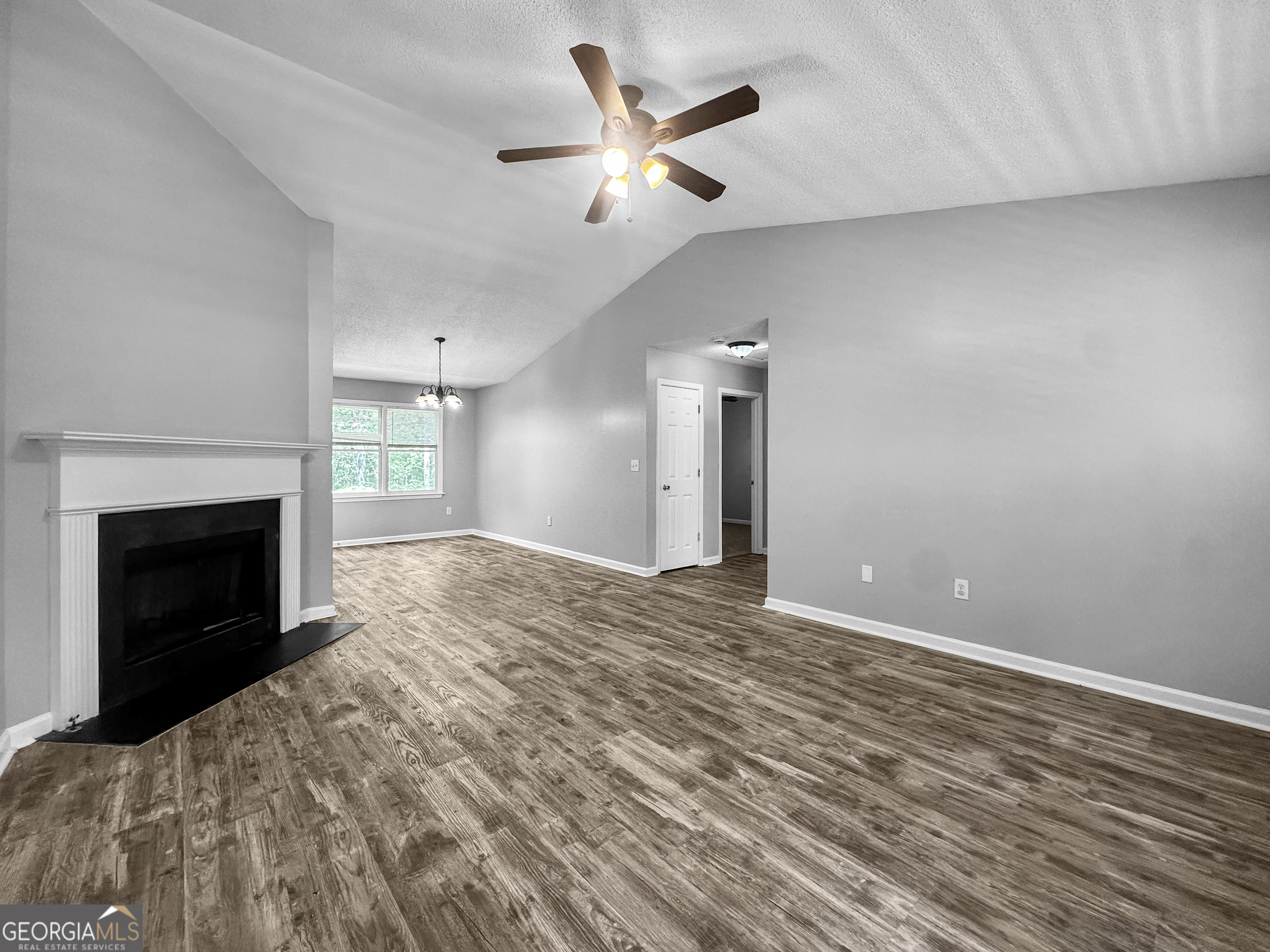 368 Wesley Mill Place Villa Rica, GA 30180 - Photo 4 of 18 a view of an empty room with a fireplace