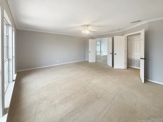 an empty room with a natural light