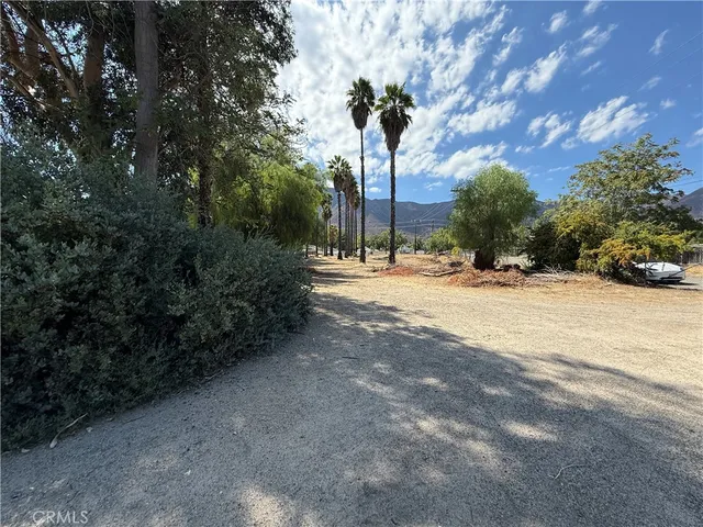 a view of road with trees