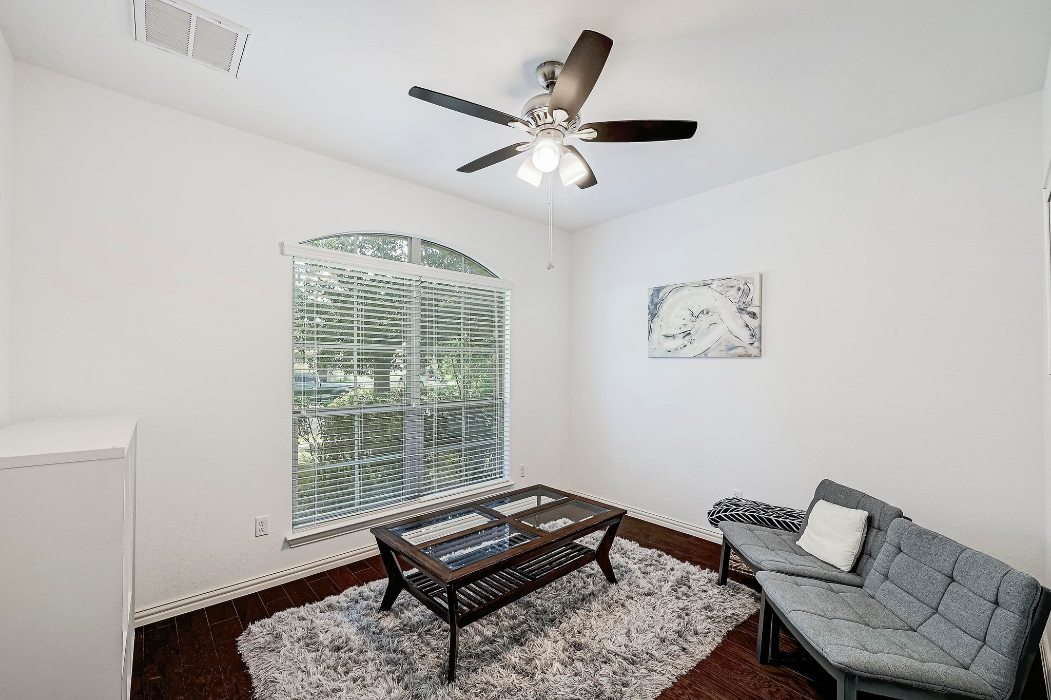2229 Turtle Mountain Bend Austin, TX 78748 - Photo 21 of 38 a living room with a baby bed furniture and a window