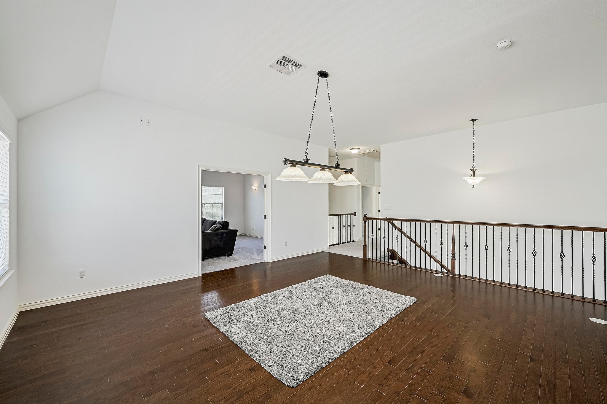 2229 Turtle Mountain Bend Austin, TX 78748 - Photo 24 of 38 a view of a hallway with a chandelier