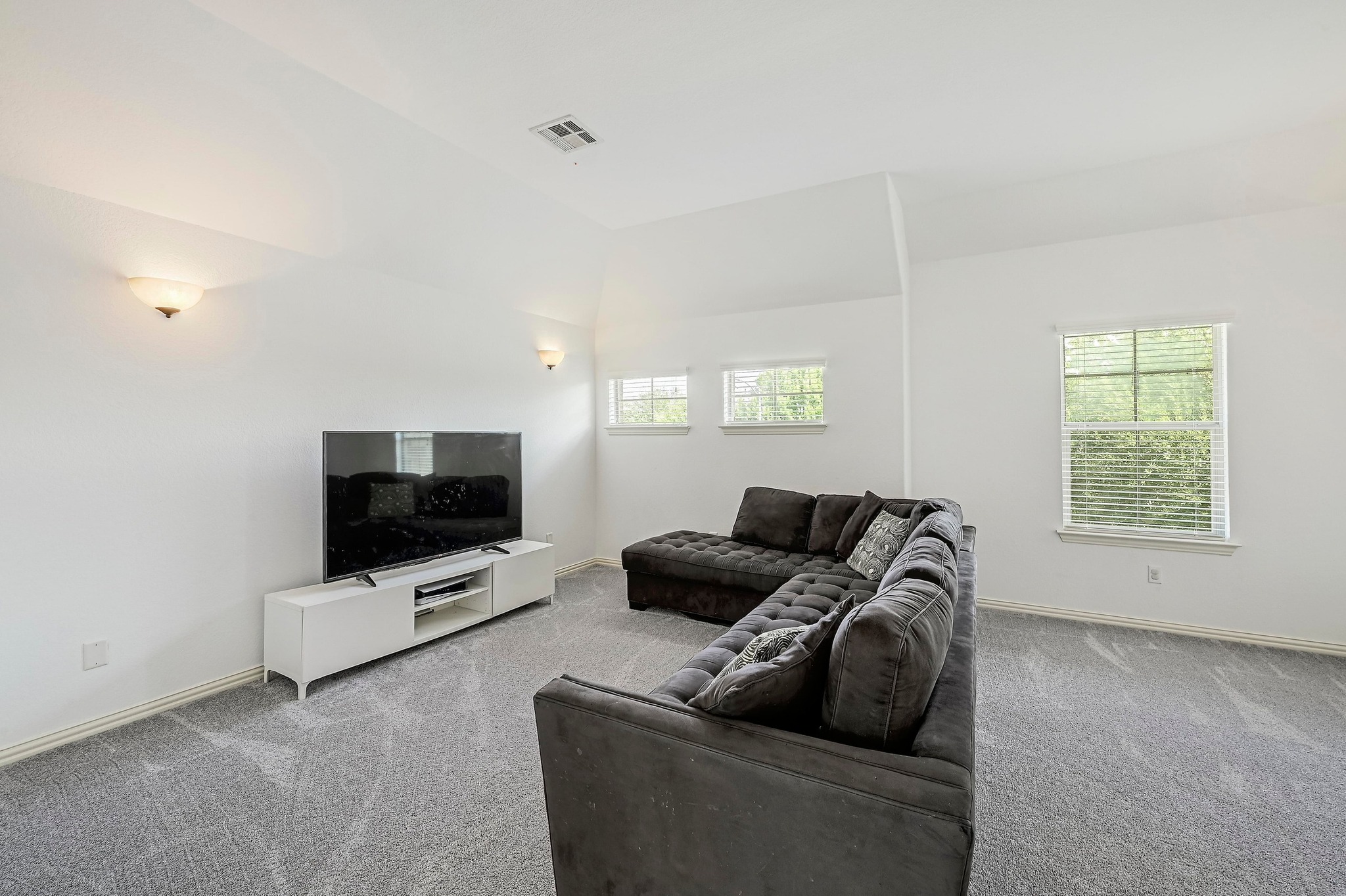 2229 Turtle Mountain Bend Austin, TX 78748 - Photo 25 of 38 a living room with furniture and a flat screen tv