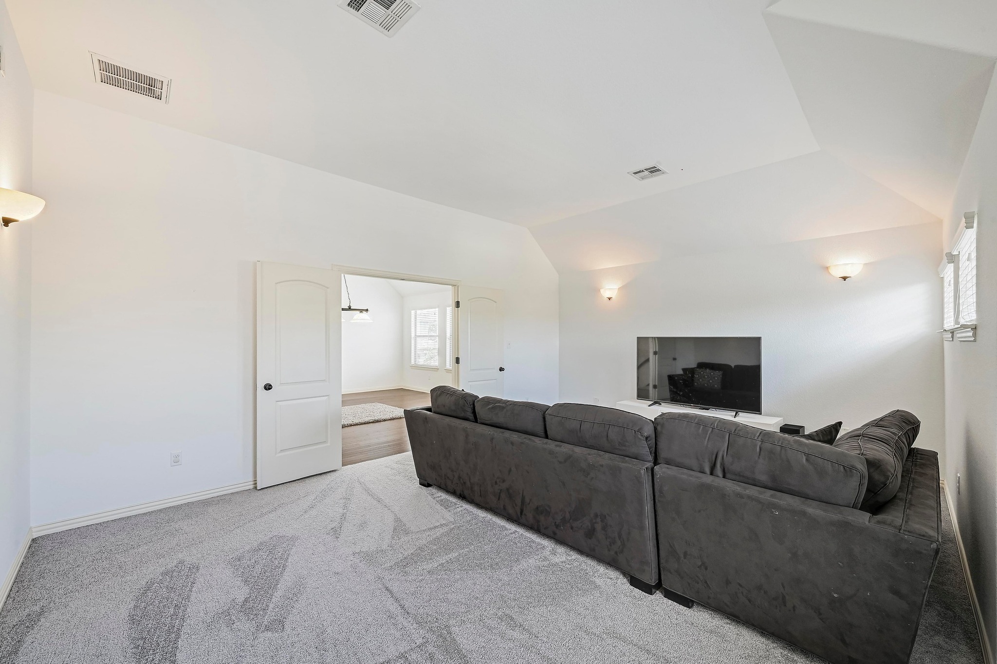 2229 Turtle Mountain Bend Austin, TX 78748 - Photo 26 of 38 a living room with furniture and a flat screen tv