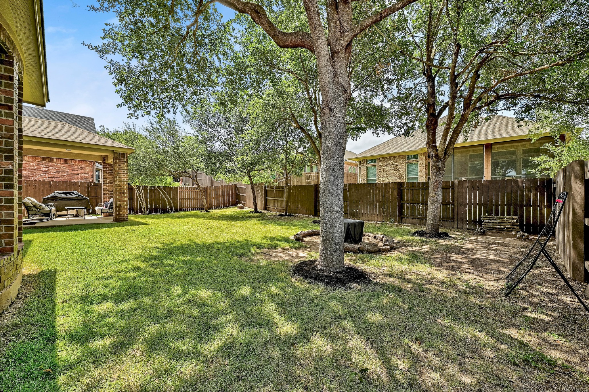 2229 Turtle Mountain Bend Austin, TX 78748 - Photo 35 of 38 a view of a house with a yard covered in snow