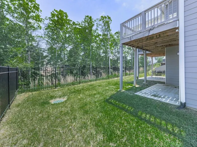 a view of a lake with sitting area