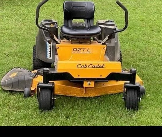 a view of a city with lush green forest