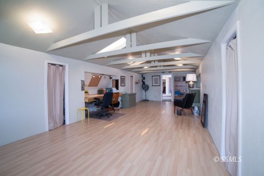 3835 West Ridgecrest Boulevard Ridgecrest, CA 93555 - Photo 41 of 50 a view of a room with wooden floor