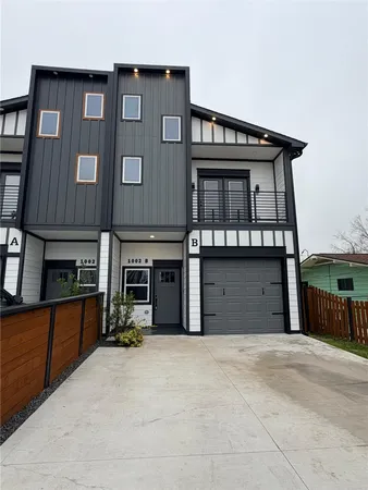 a view of a house with a garage