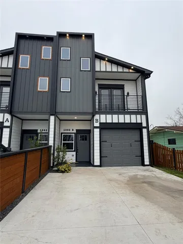 a view of a house with a garage