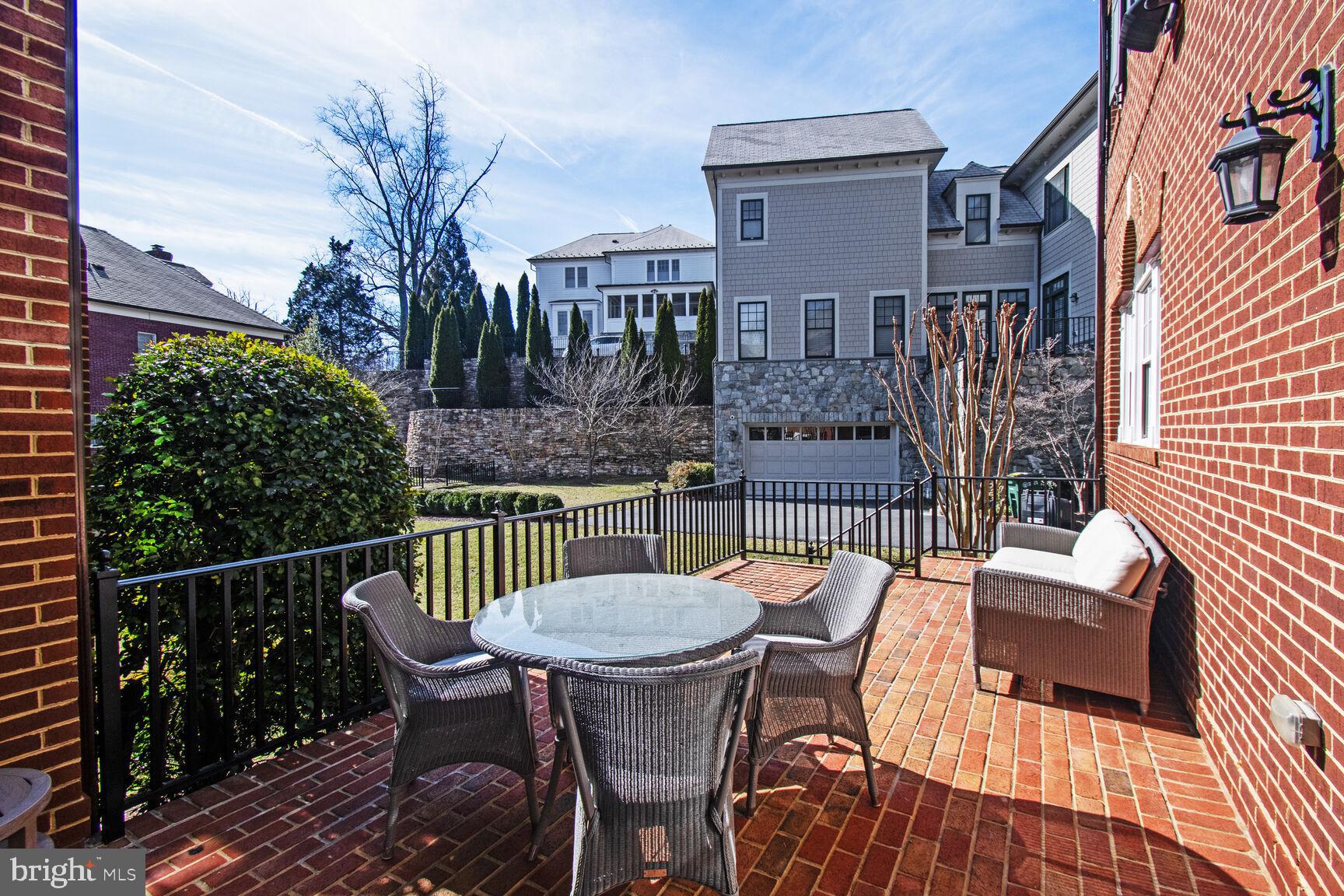 1935 Foxview Circle Northwest Washington, DC 20007 - Photo 4 of 52 a view of a patio with iron fence
