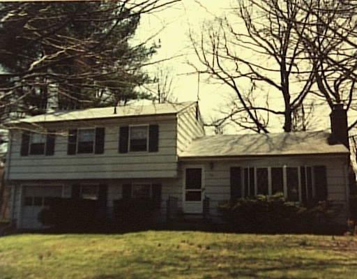 44 Cottontail Road Norwalk, CT 06854 - Photo 1 of 1 a front view of a house with a yard