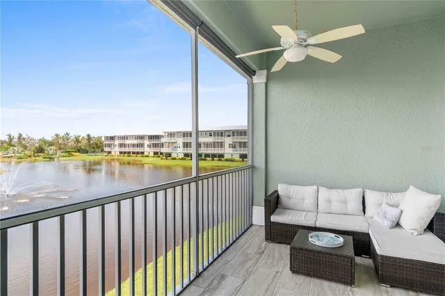 a bedroom with a bed and a table chair