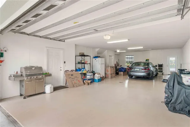 a swimming pool with outdoor seating and yard