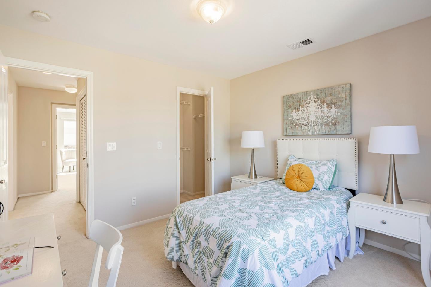 964 Cameron Circle Milpitas, CA 95035 - Photo 22 of 48 a bedroom with a bed and a lamp