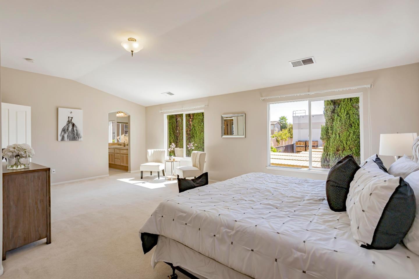 964 Cameron Circle Milpitas, CA 95035 - Photo 27 of 48 a bedroom with a bed and wooden floor