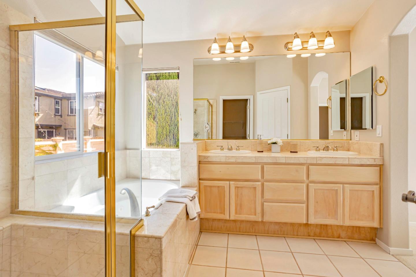 964 Cameron Circle Milpitas, CA 95035 - Photo 30 of 48 a bathroom with a sink vanity and a mirror