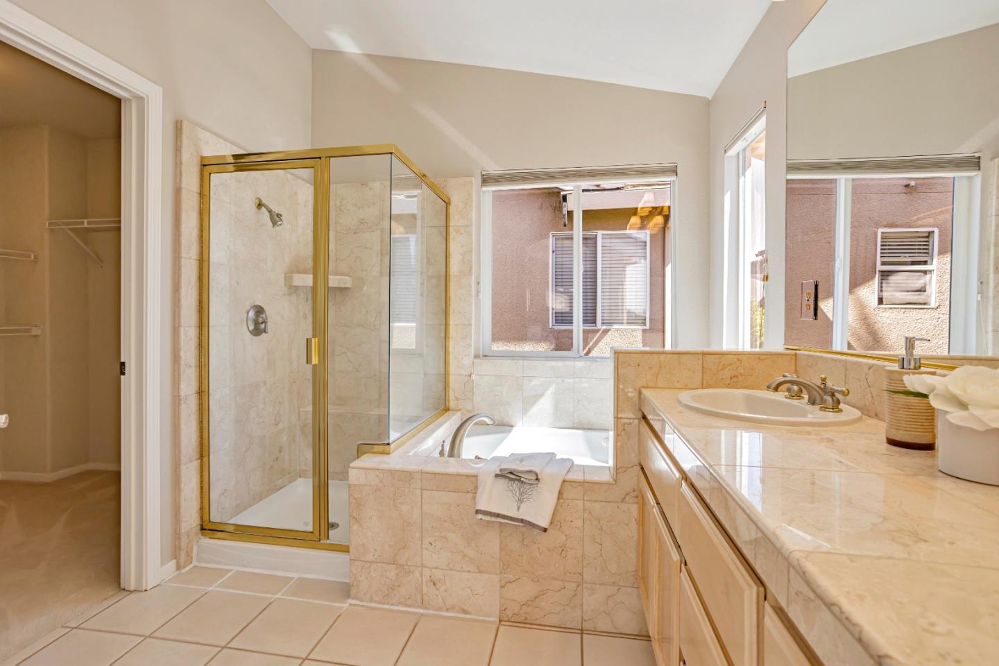 964 Cameron Circle Milpitas, CA 95035 - Photo 31 of 48 a spacious bathroom with a tub shower and sink