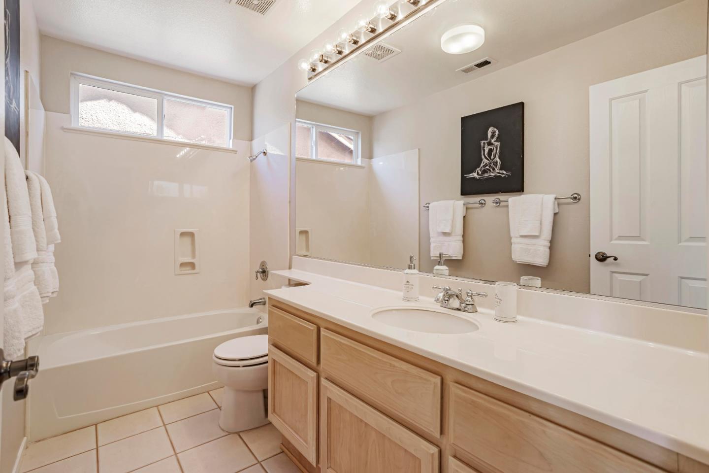 964 Cameron Circle Milpitas, CA 95035 - Photo 33 of 48 a bathroom with a sink a toilet and shower