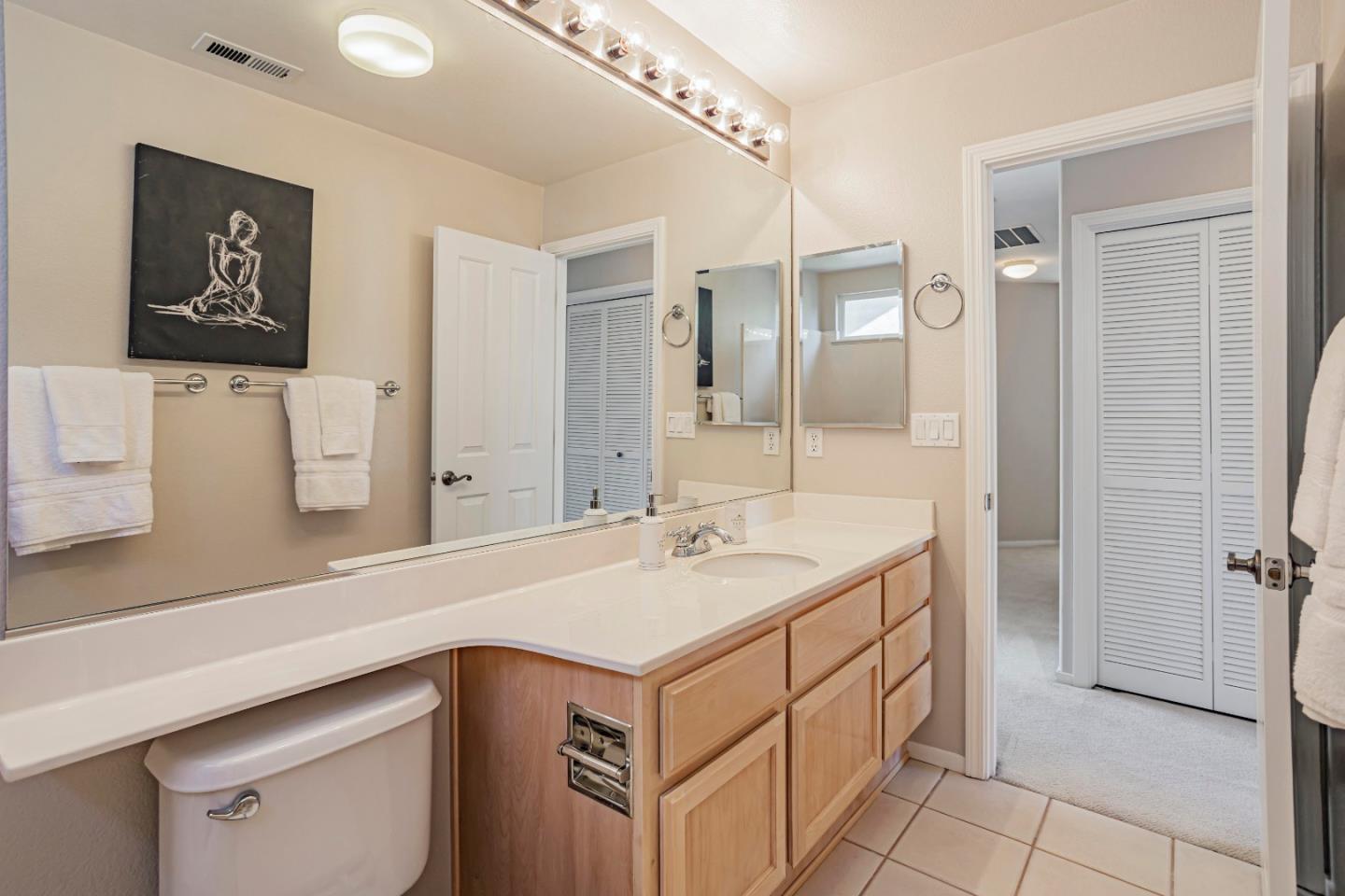 964 Cameron Circle Milpitas, CA 95035 - Photo 34 of 48 a bathroom with a sink and a mirror