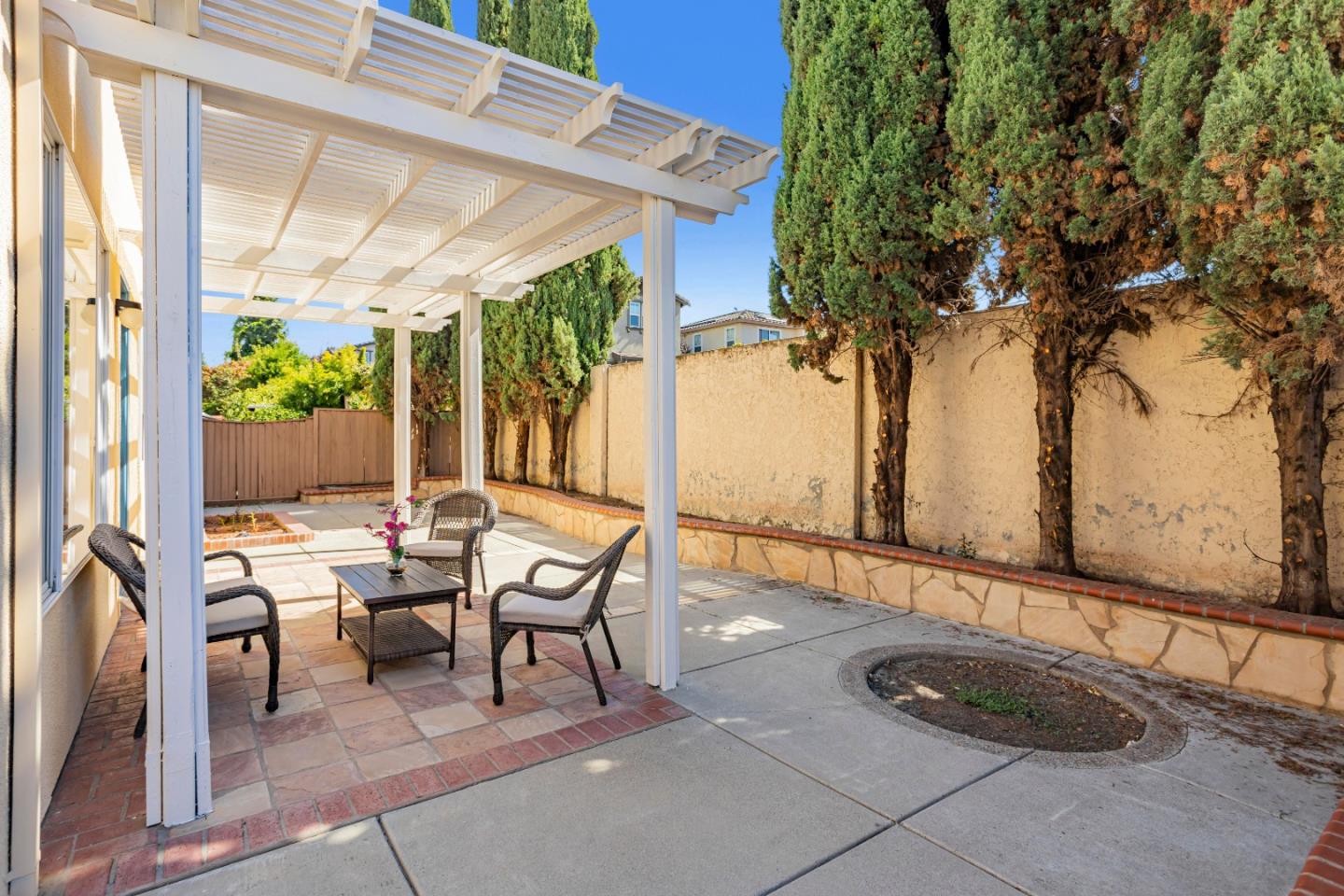 964 Cameron Circle Milpitas, CA 95035 - Photo 40 of 48 a view of a patio with table and chairs and potted plants