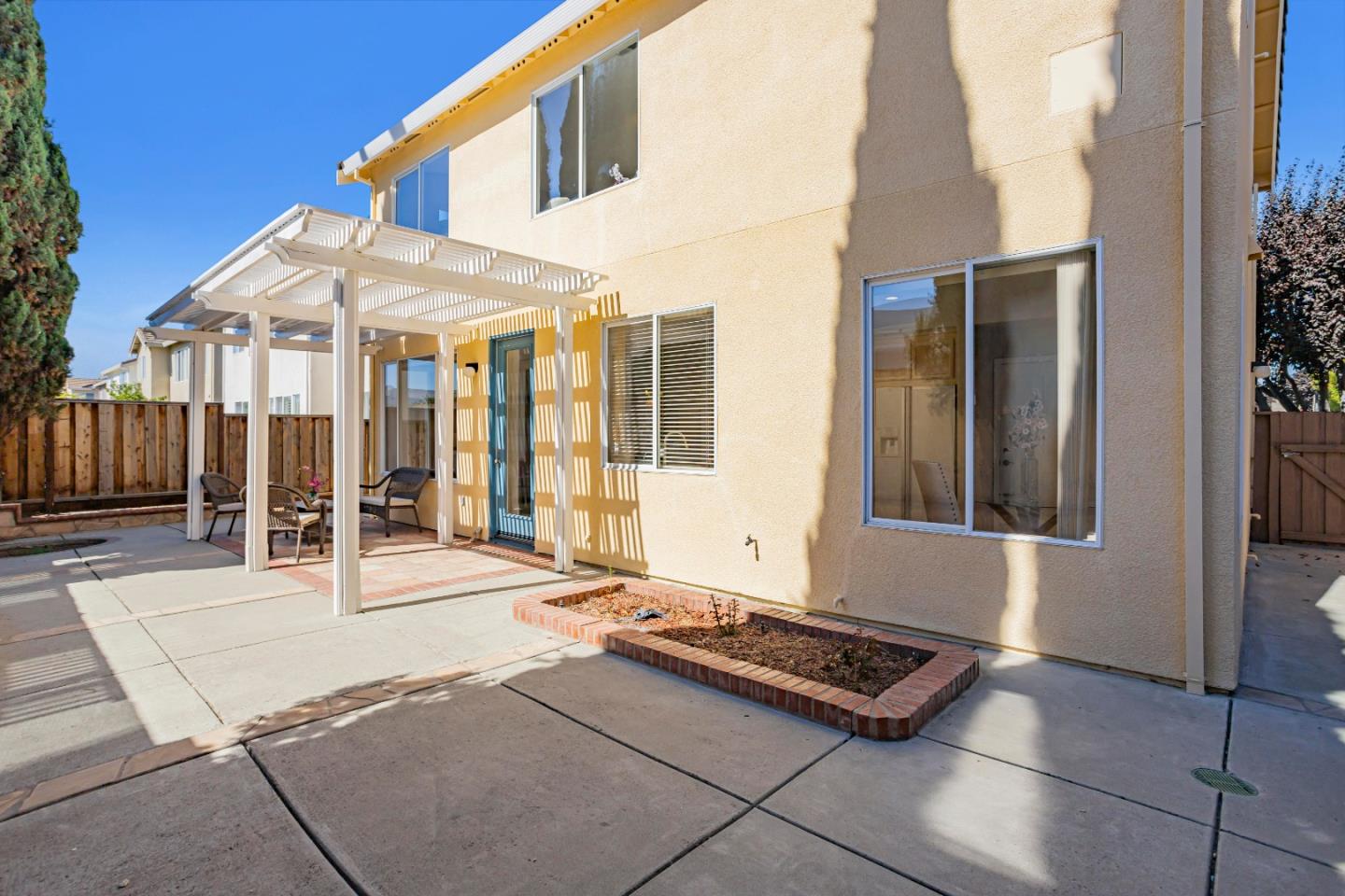 964 Cameron Circle Milpitas, CA 95035 - Photo 43 of 48 a backyard of a house with sofas